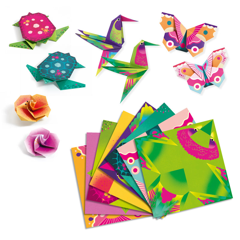 Colorful origami paper sheets with folded models on a white background