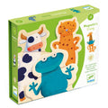 Box of magnetic animal puzzle with cow, cat, and frog designs on a white background