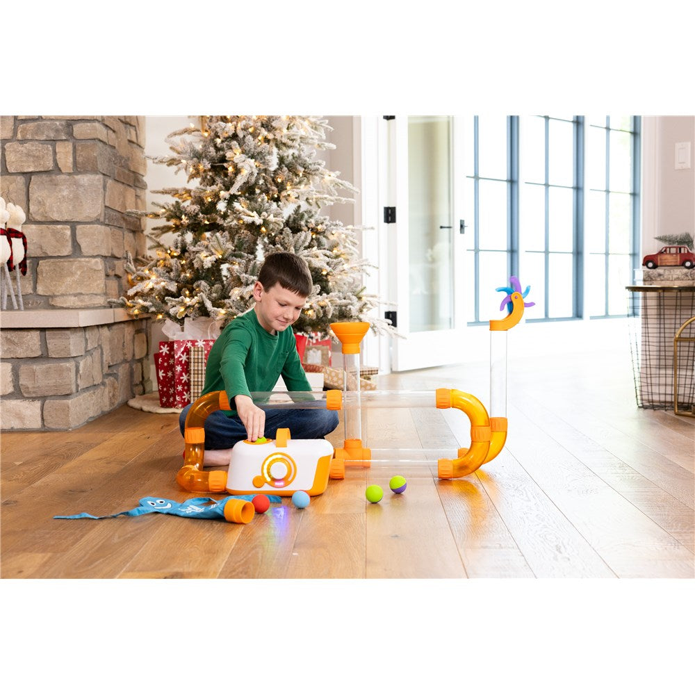 Child playing with Fat Brain Toys - Air Toobz - Whirlwind 