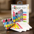 Coggy fidget toy set with packaging on a wooden surface