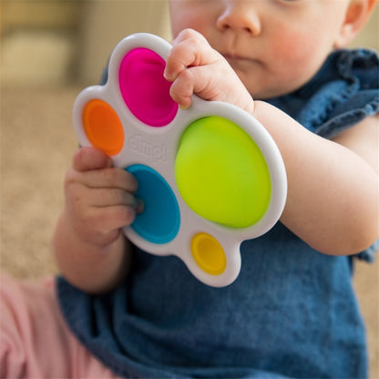 Baby playing with Fat Brain Toys - Dimpl 