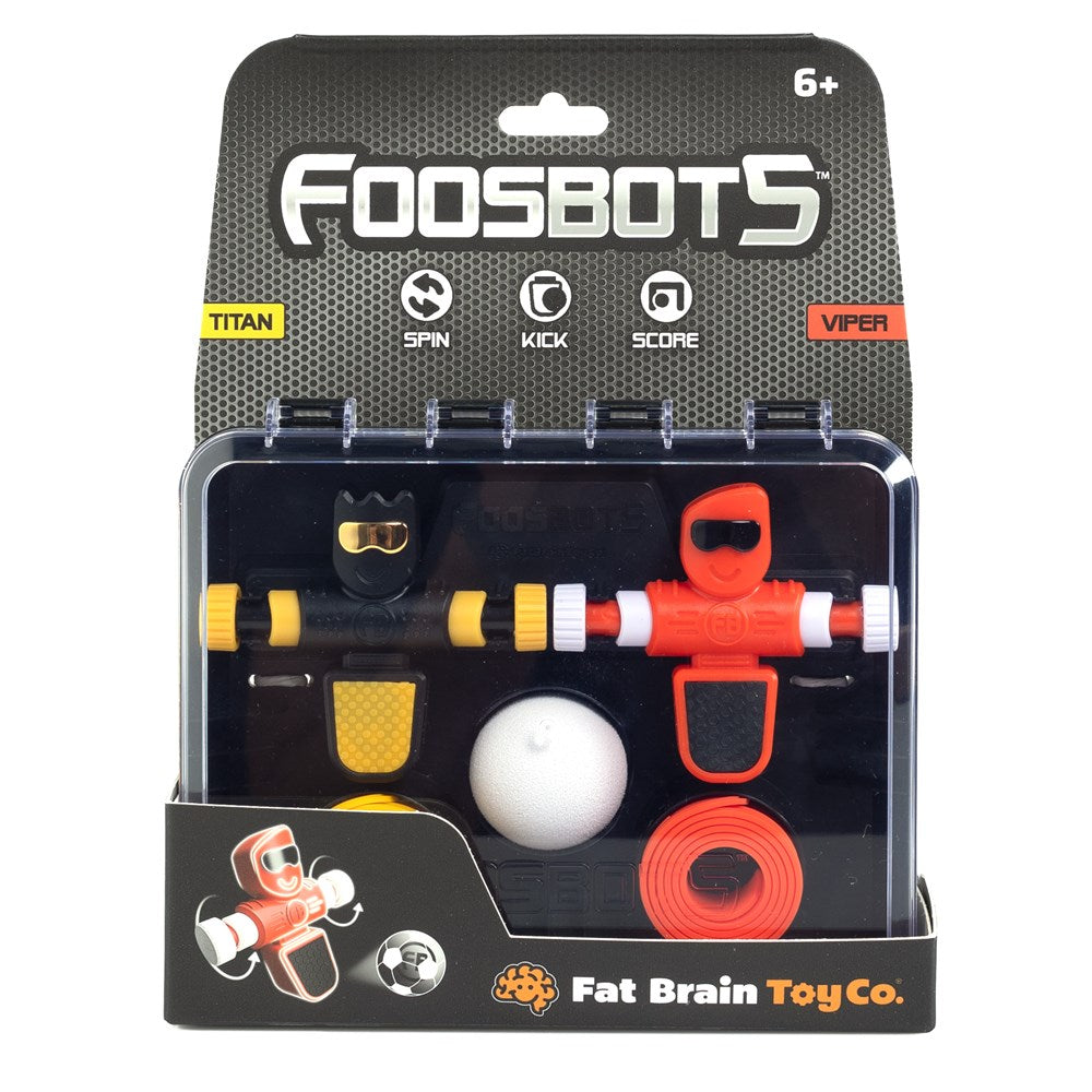 Packaging of Foosbots toy set showing two silicone goal lines, a ball, and a Foosbot robot with red and white colors on a black background.