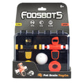 Packaging of Foosbots toy set showing two silicone goal lines, a ball, and a Foosbot robot with red and white colors on a black background.