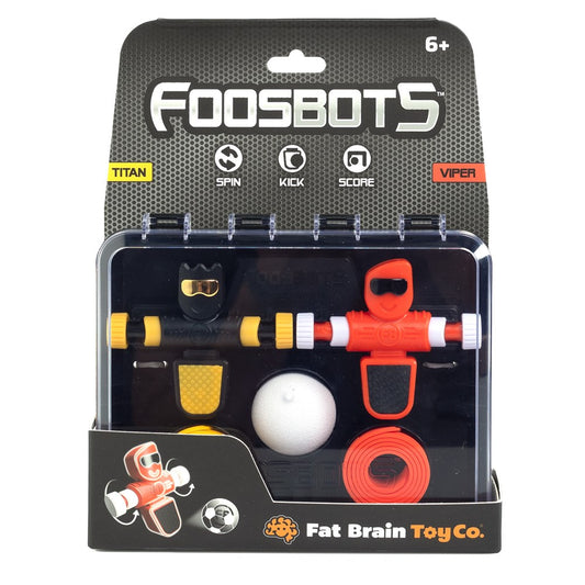 Packaging of Foosbots toy set showing two silicone goal lines, a ball, and a Foosbot robot with red and white colors on a black background.