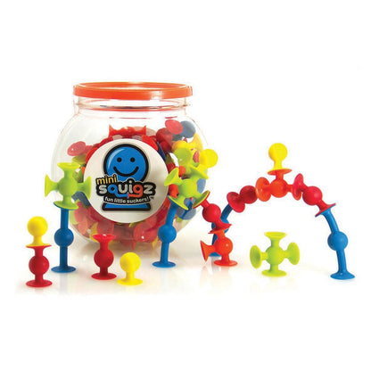 Colorful mini squigz toy set with a clear jar on a white background