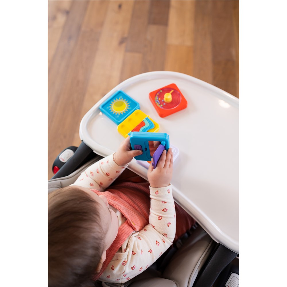 Infant playing with Fat Brain Toys - PlayTab - Sensory Set 4