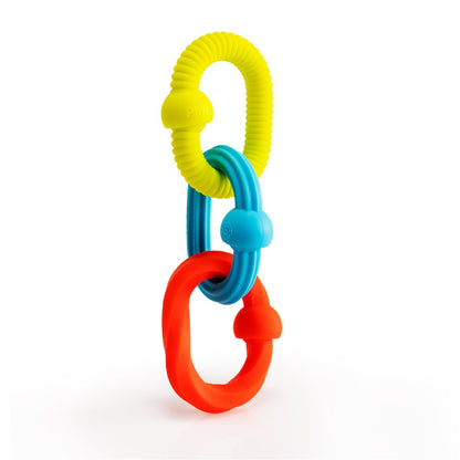 Colorful baby teething ring with yellow, blue, and red components on a white background
