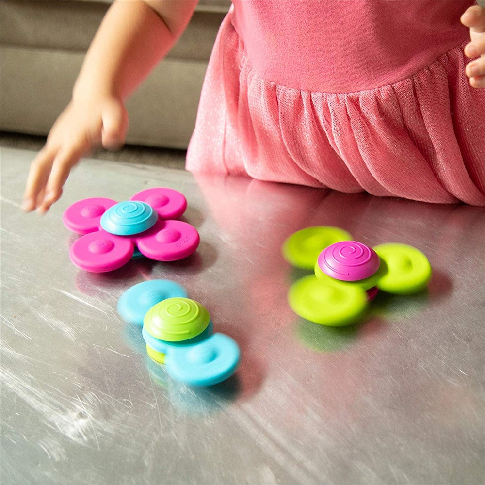 Child spinning Fat Brain Toys - Whirly Squigz