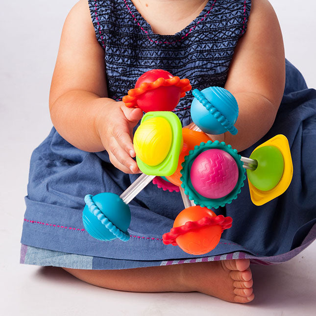 Child playing with Fat Brain Toys - Wimzle