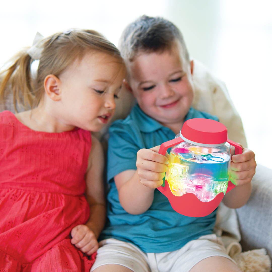 Children playing with Glo Pals - Sensory Play Jar