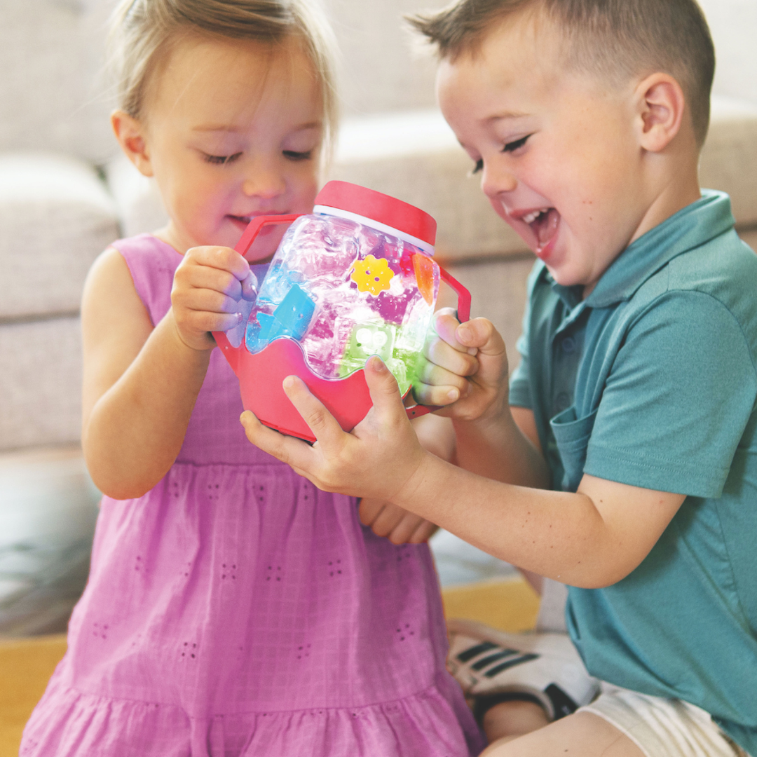 Children playing with Glo Pals - Sensory Play Jar