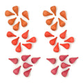 Red and orange candy pieces arranged in a circular pattern on a white background