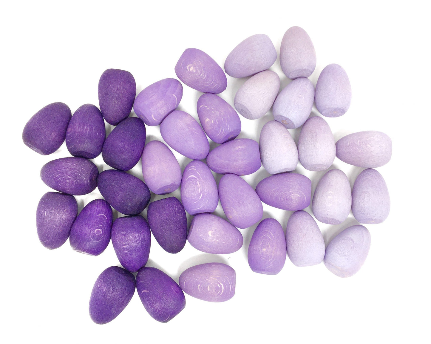 Purple and white stones on a white background