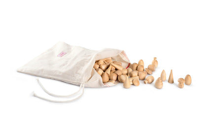 Wooden cones and a drawstring bag on a white background