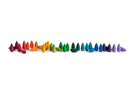 Row of colorful wooden beads on a white background
