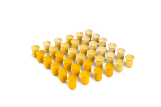 Arrangement of yellow and wooden tulips on a white background