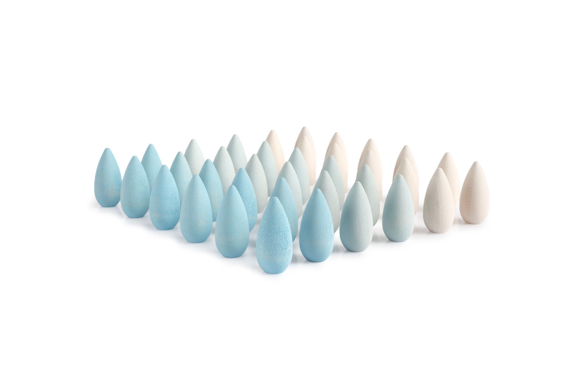 Set of blue and white wooden teardrop-shaped objects on a white background
