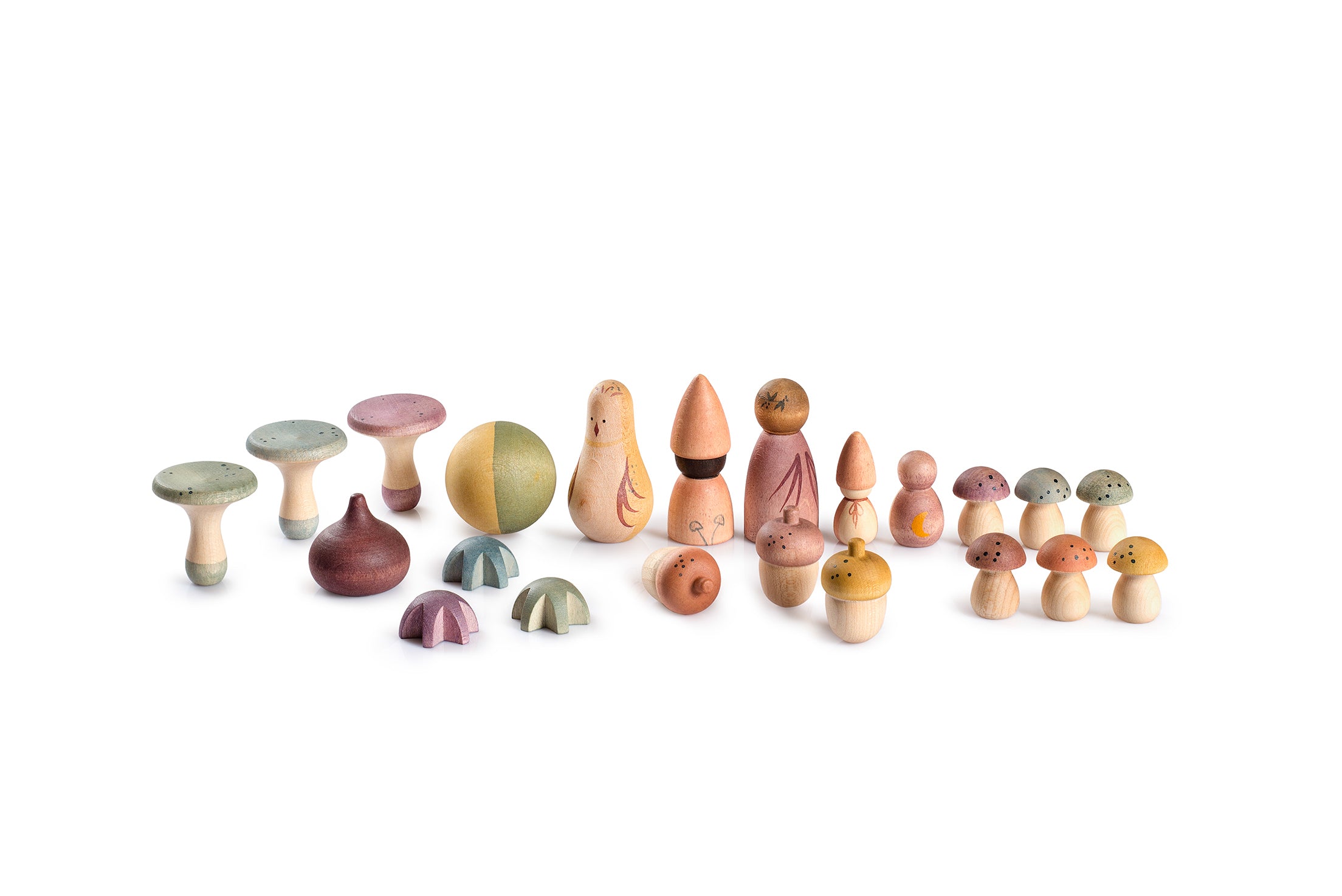 Set of small wooden figurines in various shapes and colors on a white background