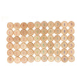 Wooden number tiles with numbers printed on them arranged in a grid pattern.