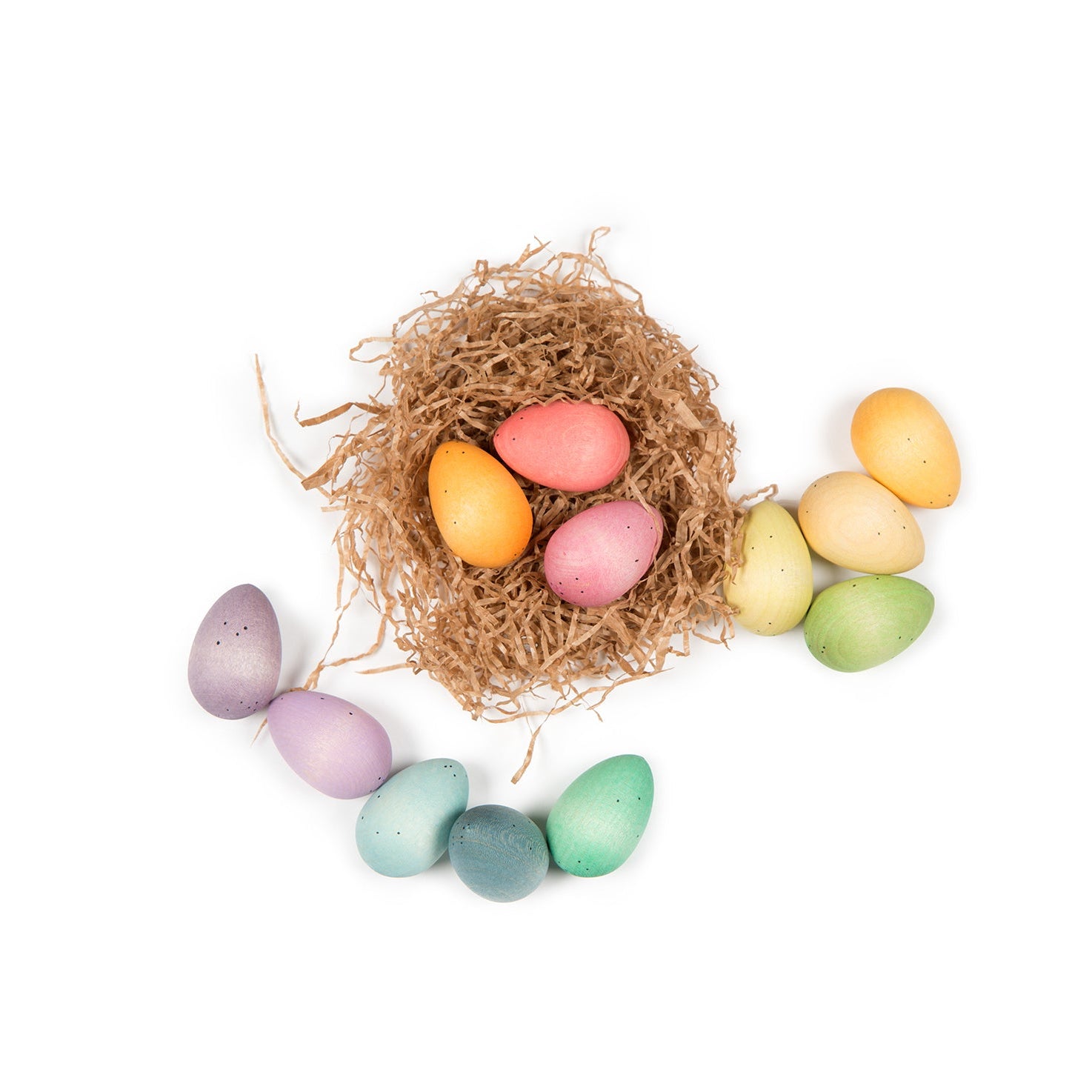 Nest with colorful eggs on a white background