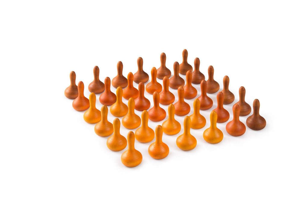 Set of orange and brown wooden pegs arranged in a pattern on a white background