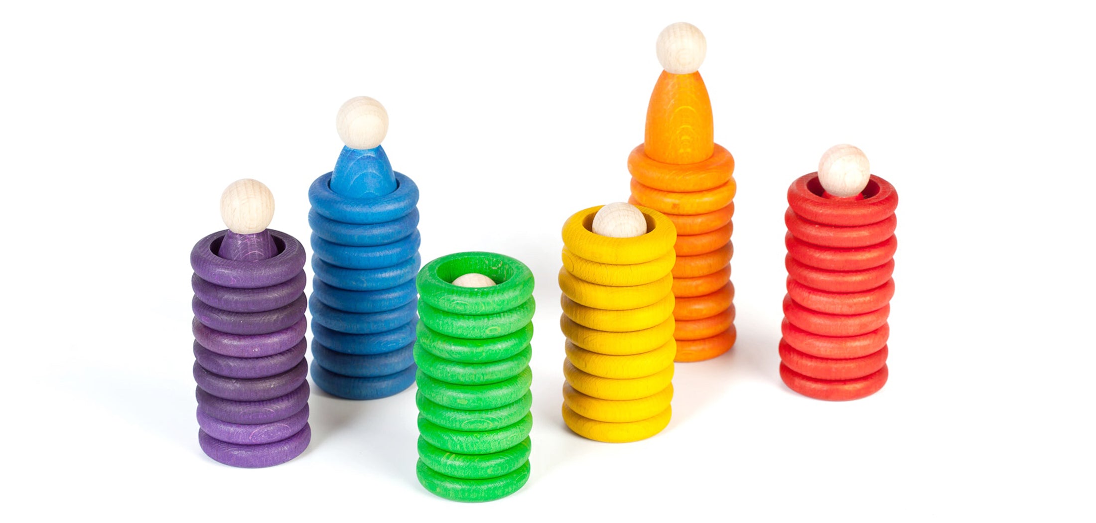 Set of colorful wooden toys on a white background