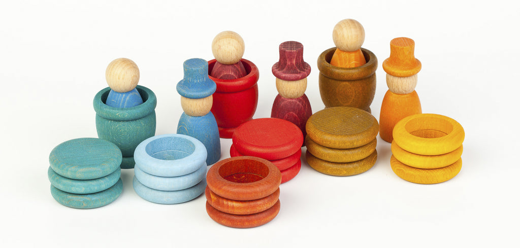 Set of colorful wooden toys on a white background