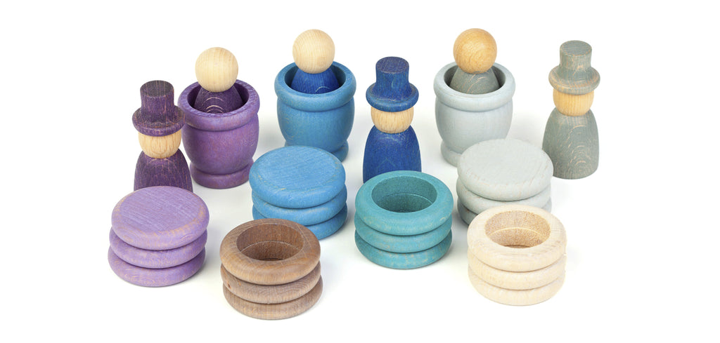 Set of colorful wooden toys on a white background