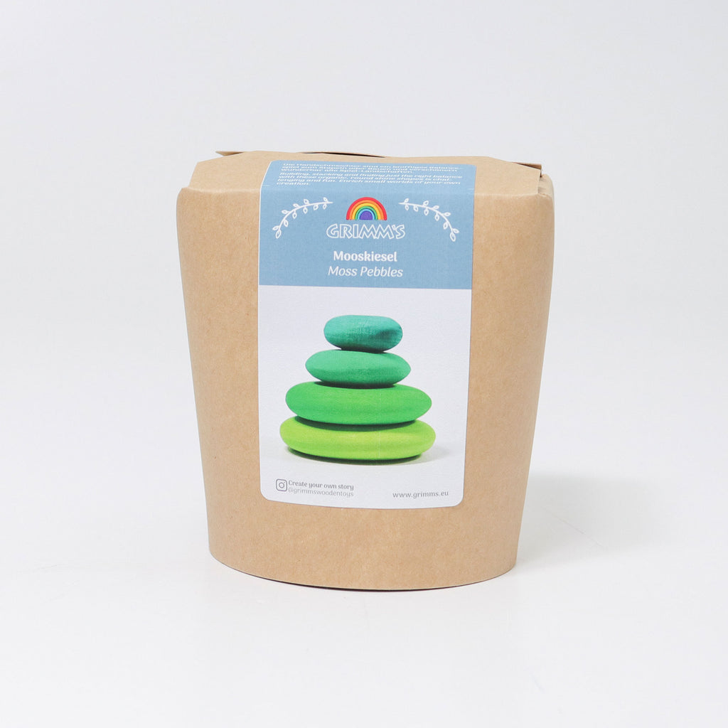 Cardboard box with a label featuring green stacking stones on a white background