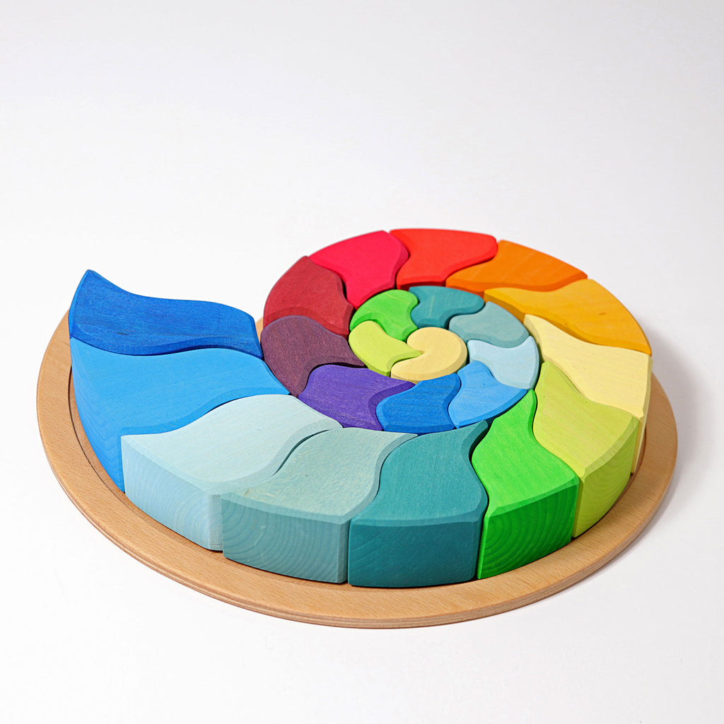 Colorful wooden puzzle on a white background