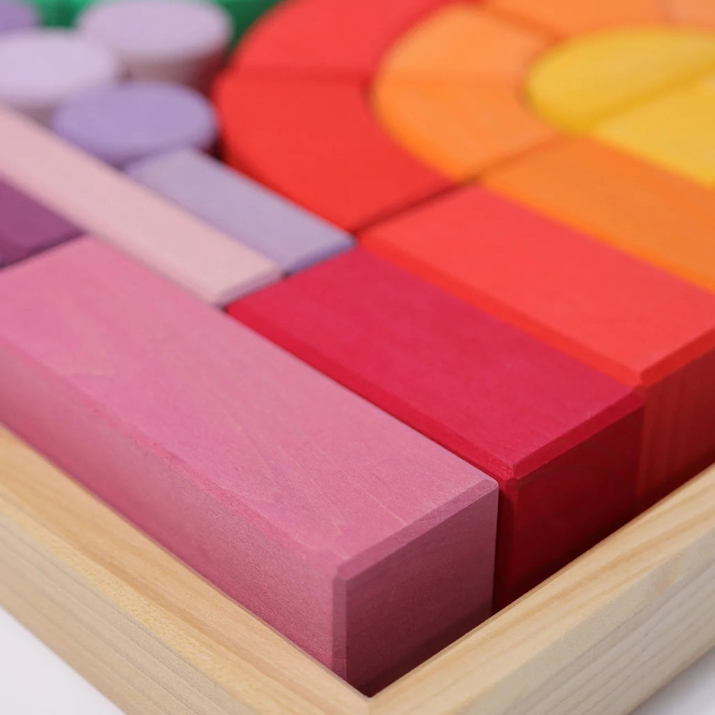 Close-up of colorful wooden blocks in a wooden box