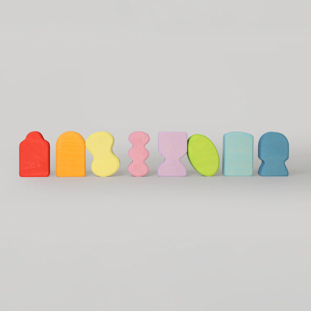 Set of colorful wooden blocks on a light gray background