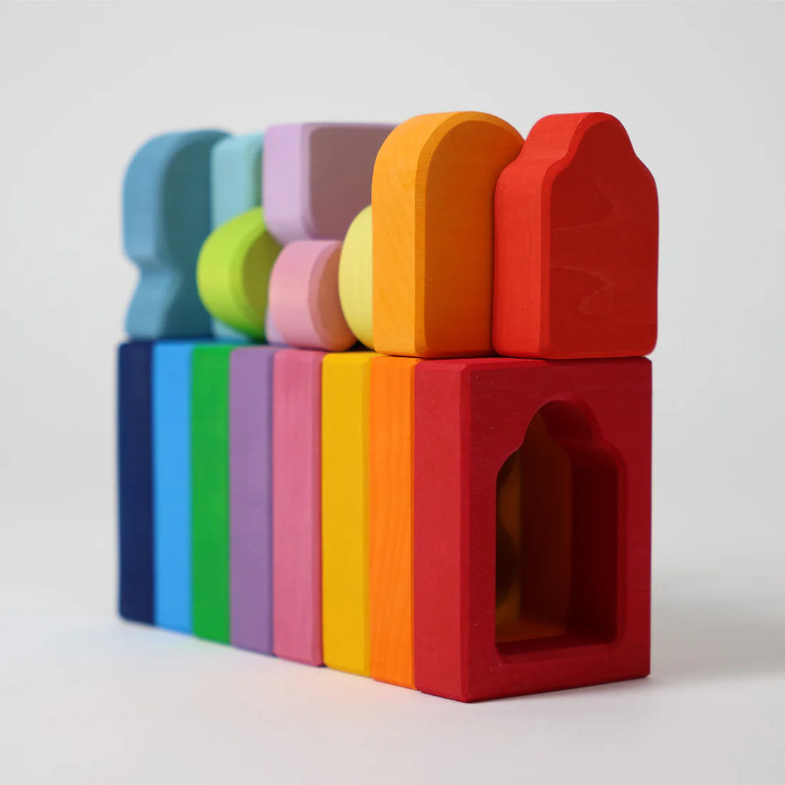 Stack of colorful wooden blocks on a white background