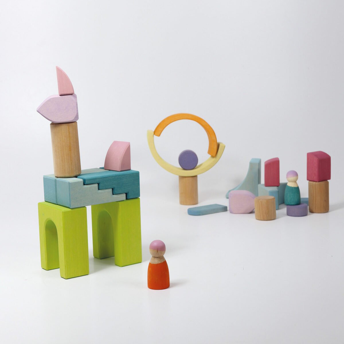 Colorful wooden toys on a white background