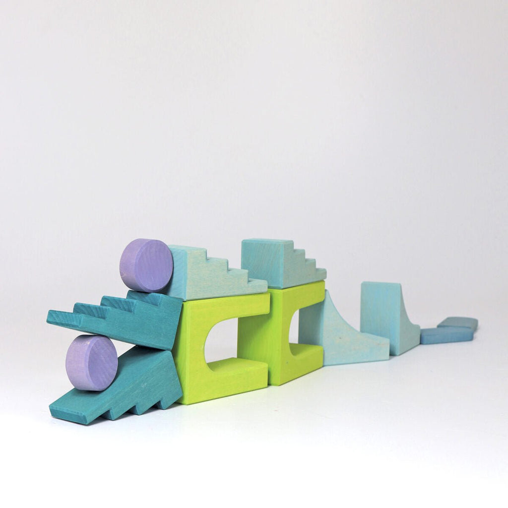 Colorful wooden toy blocks on a white background