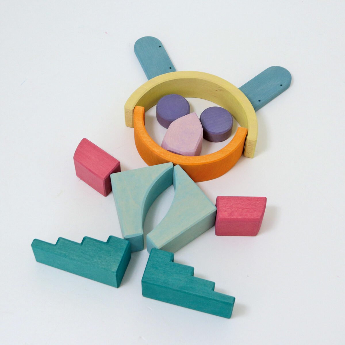 Colorful wooden toy blocks on a white background