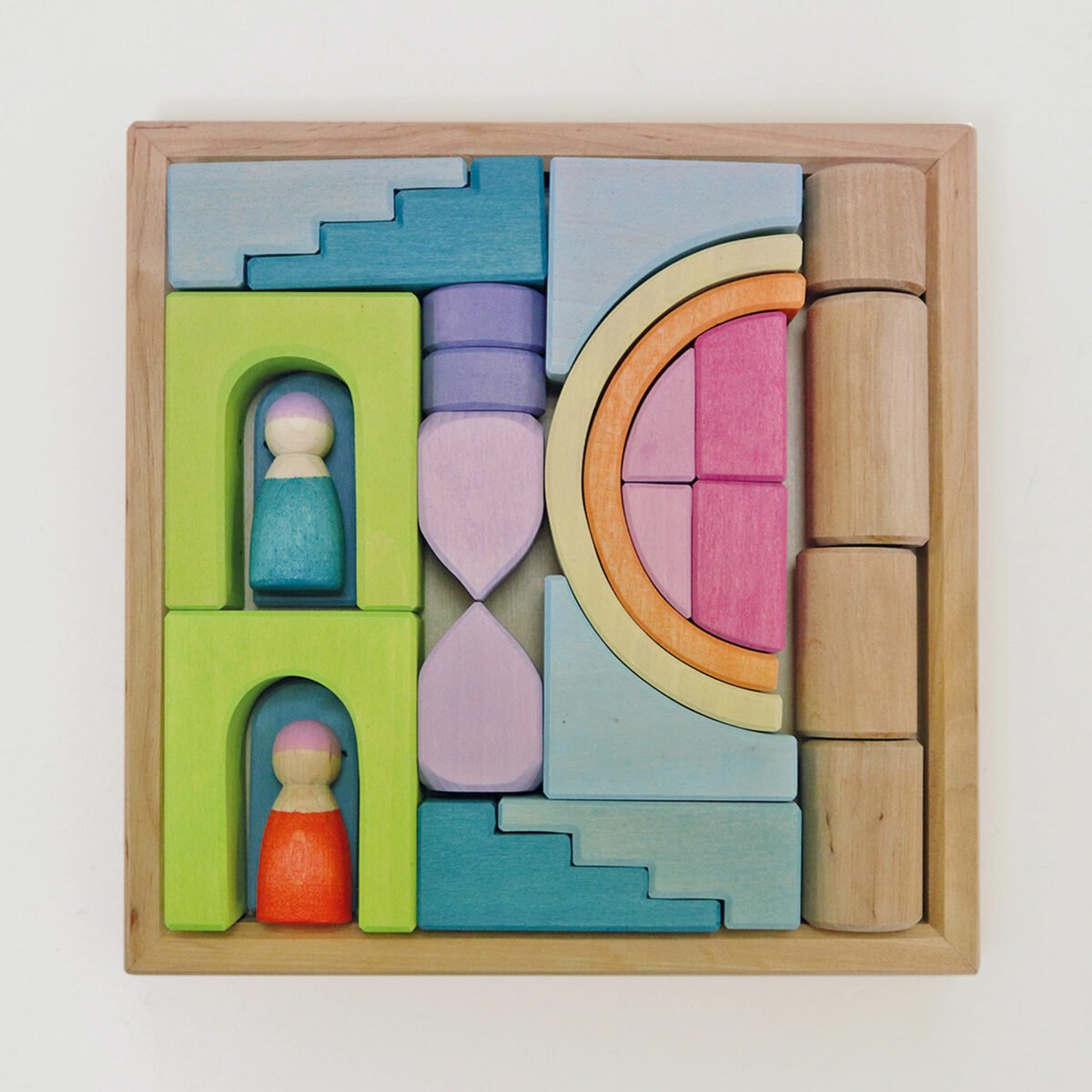 Colorful wooden building blocks with geometric shapes and small figurines on a light background