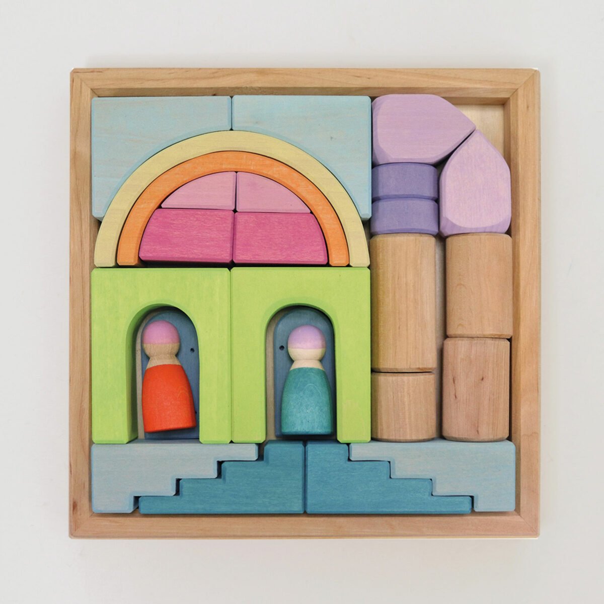 Colorful wooden building blocks with arches and figures on a light background