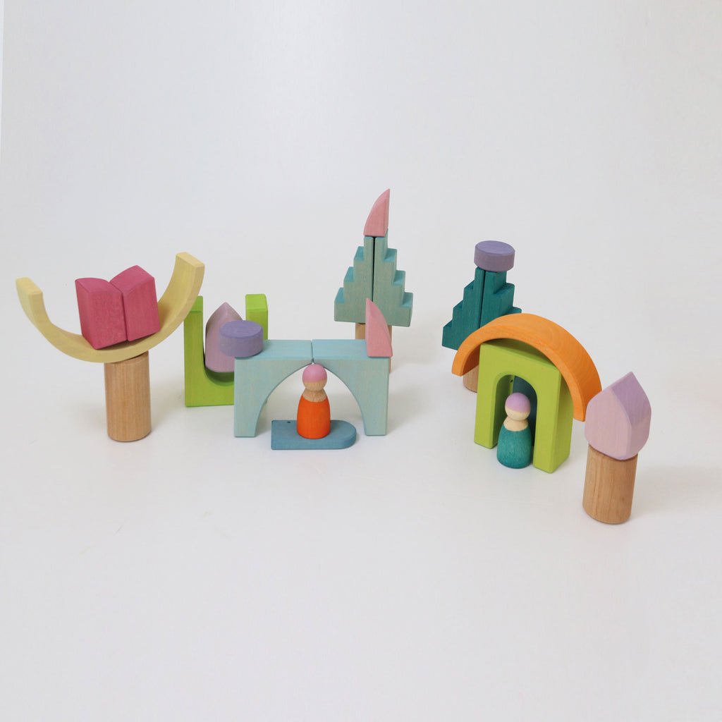 Colorful wooden toy set on a white background