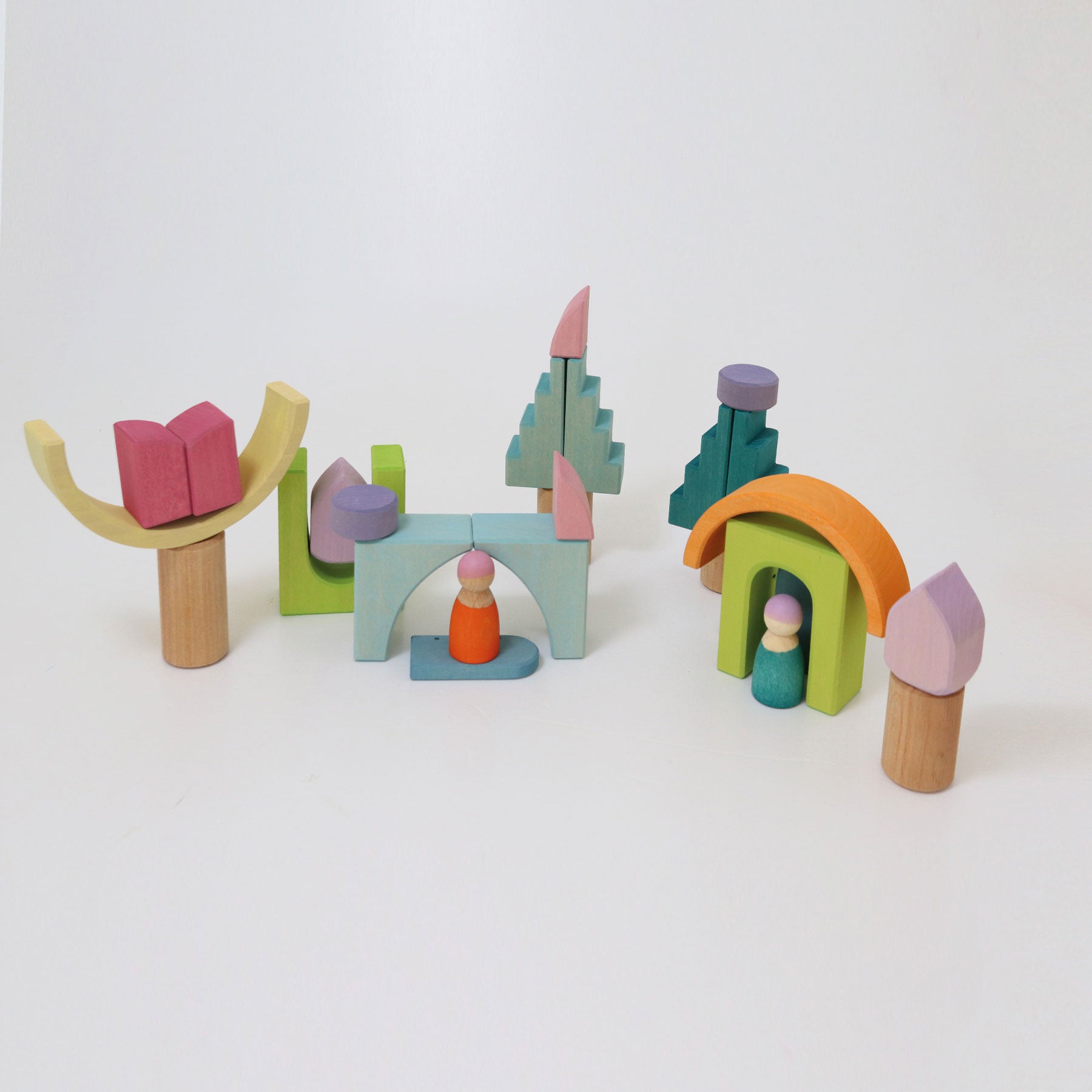 Colorful wooden toy set on a white background