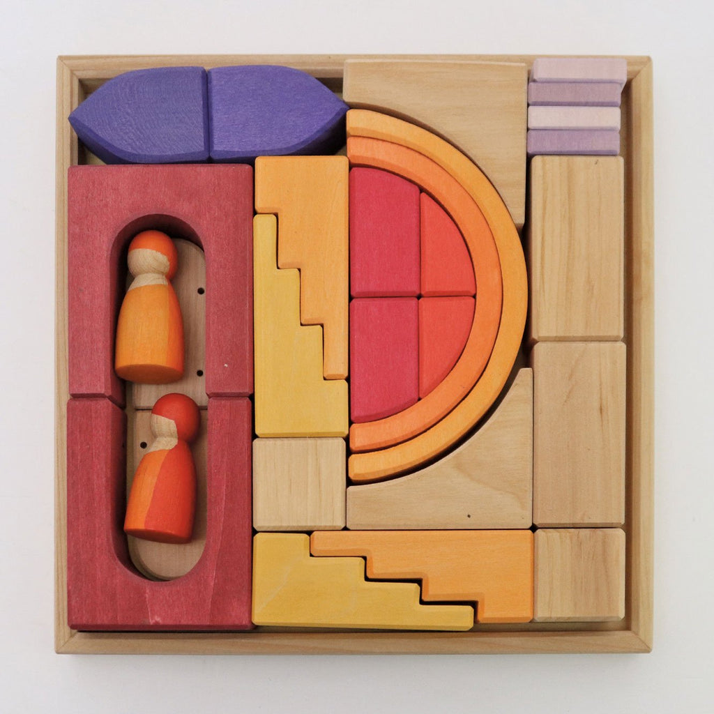 Set of wooden building blocks with colorful shapes and figures on a white background