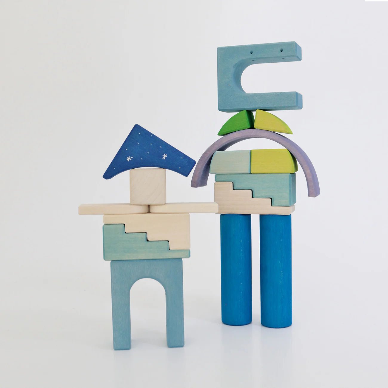 Colorful wooden block toys on a white background