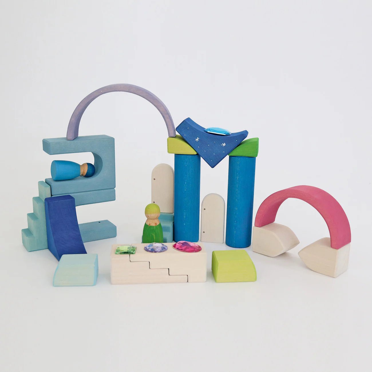 Colorful wooden toy set on a light gray background