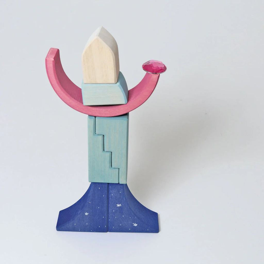 Colorful toy sword with pink hilt, blue blade, and beige top on a white background