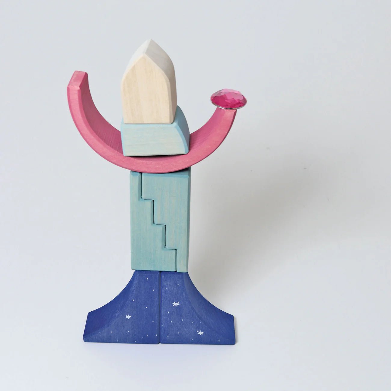 Colorful toy sword with pink hilt, blue blade, and beige top on a white background