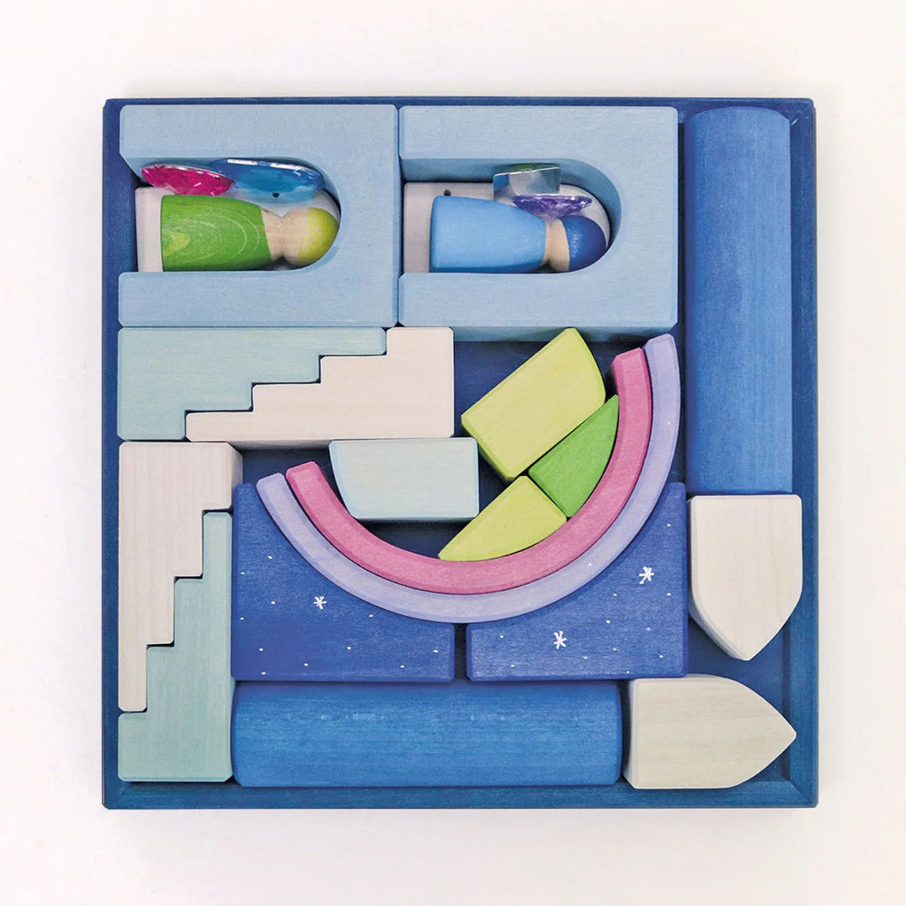 Colorful wooden puzzle toy with geometric shapes on a white background