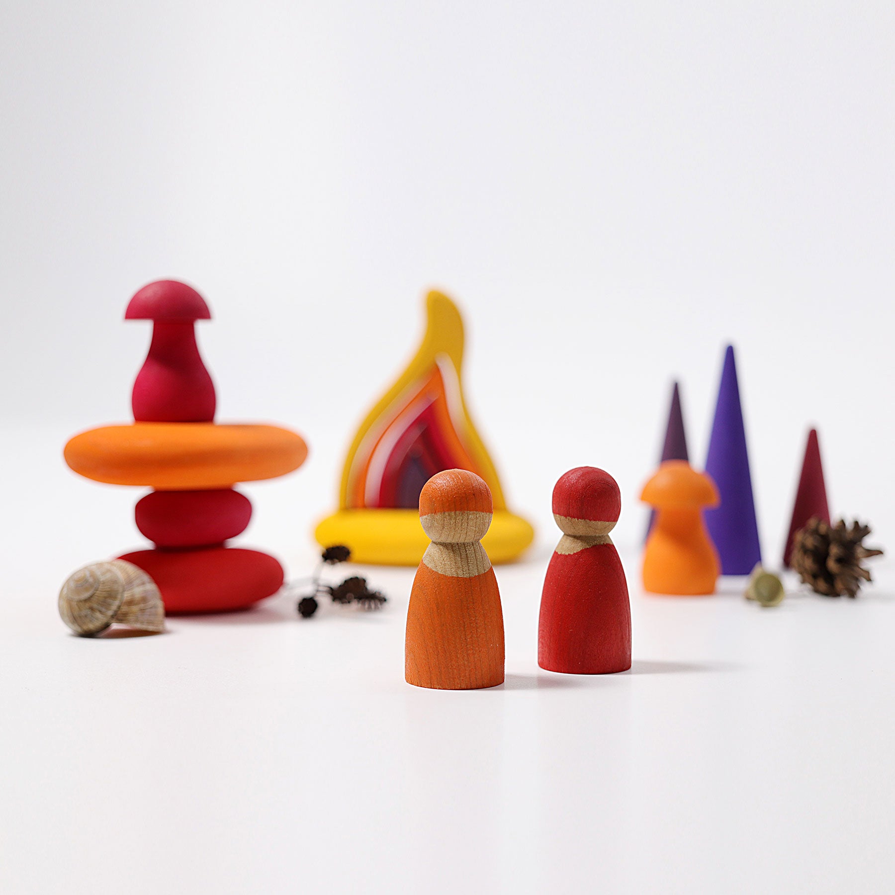 Colorful wooden toys on a white background