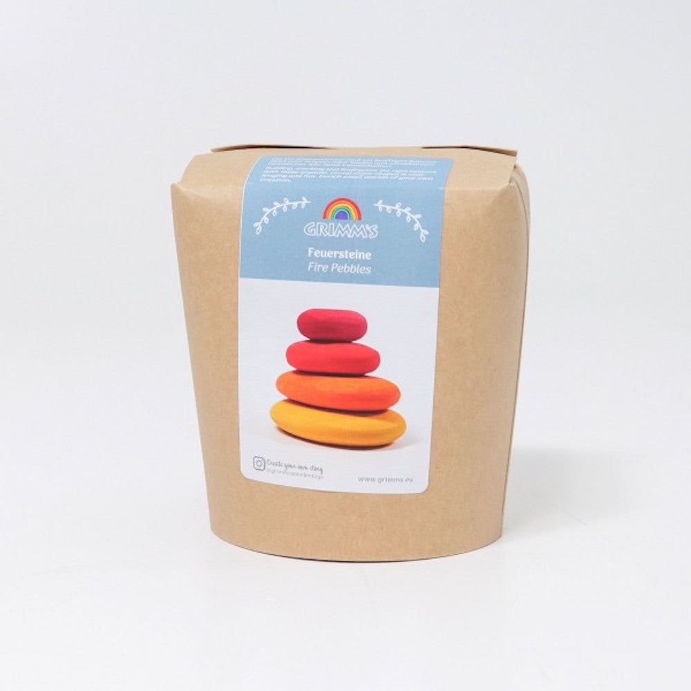 Kraft paper packaging with a colorful label featuring stacked stones on a white background