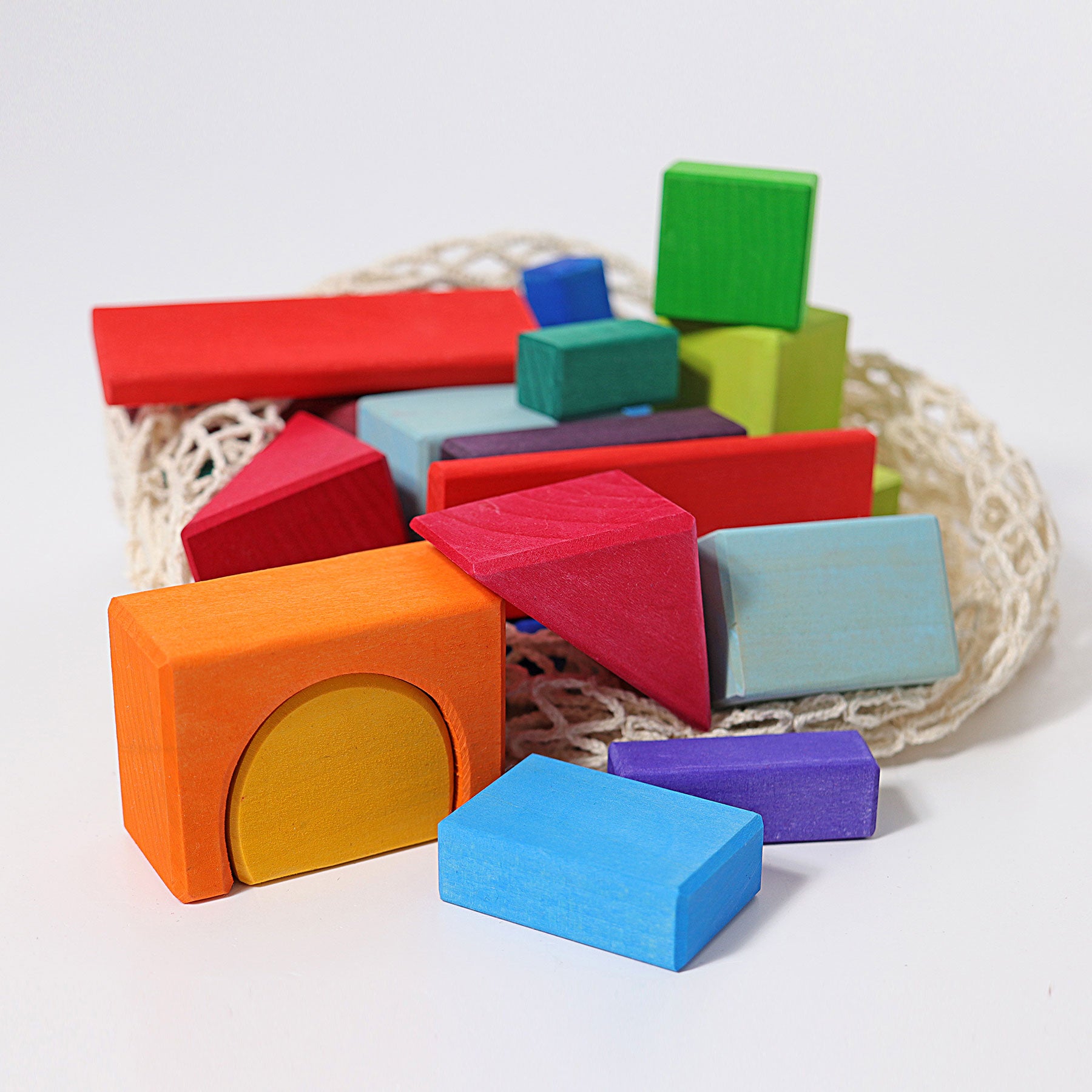 Colorful wooden blocks on a textured surface
