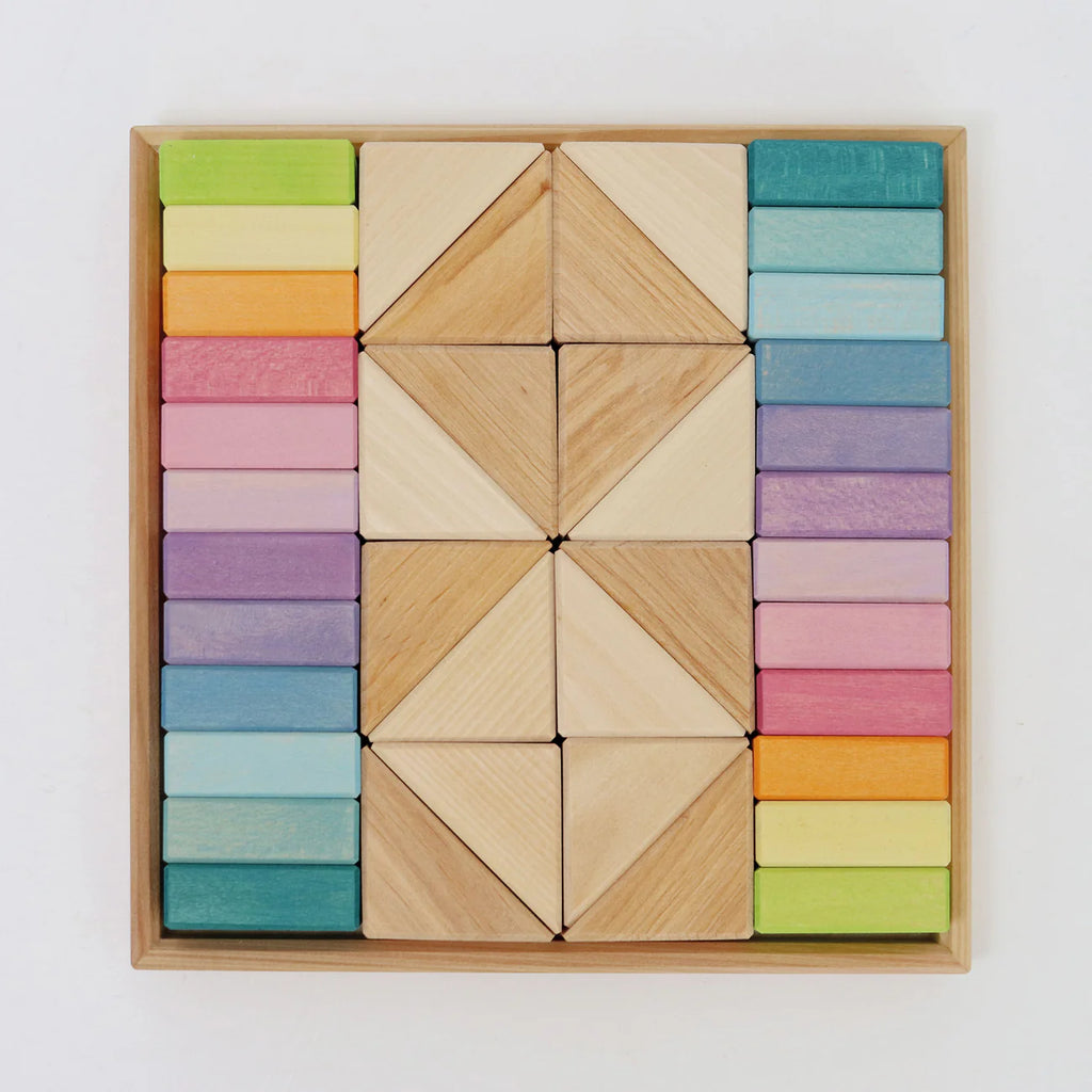 Colorful wooden block set in a box on a white background